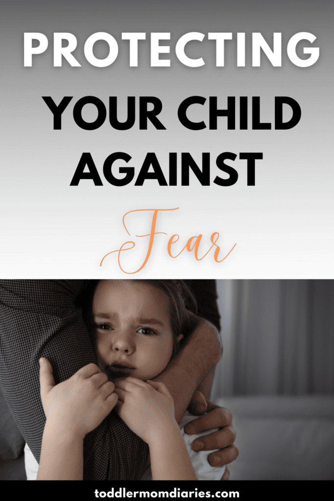 parent protecting a child who is afraid with the spirit of fear