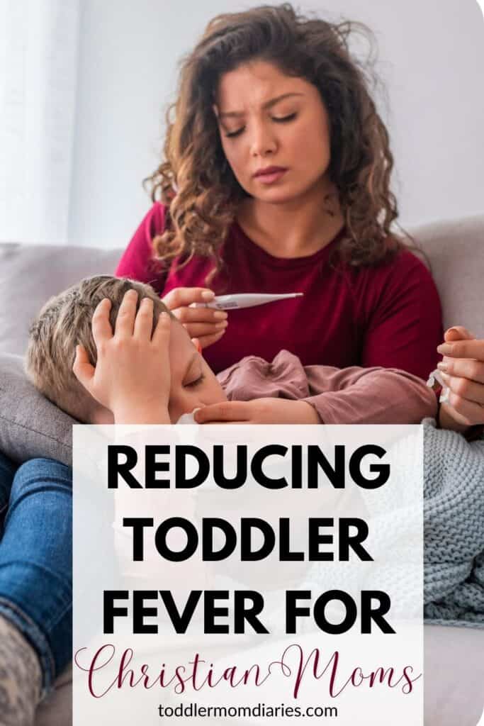 mom taking her sons temperature toddler fever