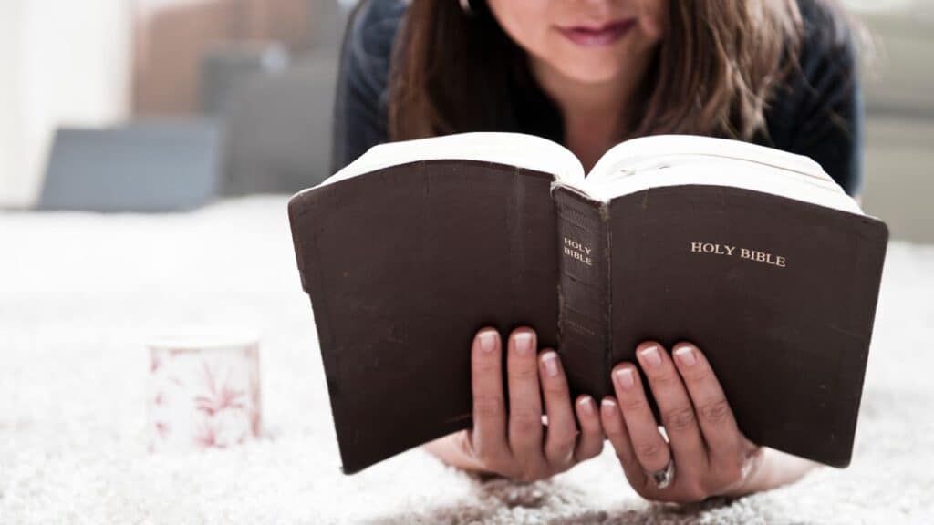 An Unshakeable Godly Mom reading her bible